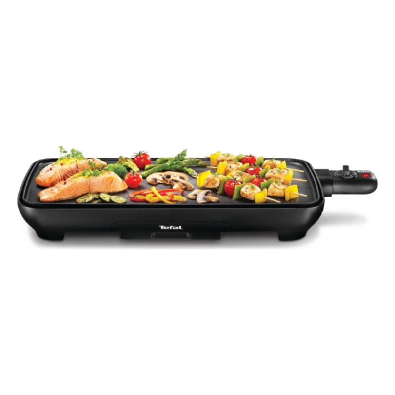 Plancha électrique Tefal avec saumon, légumes et brochettes